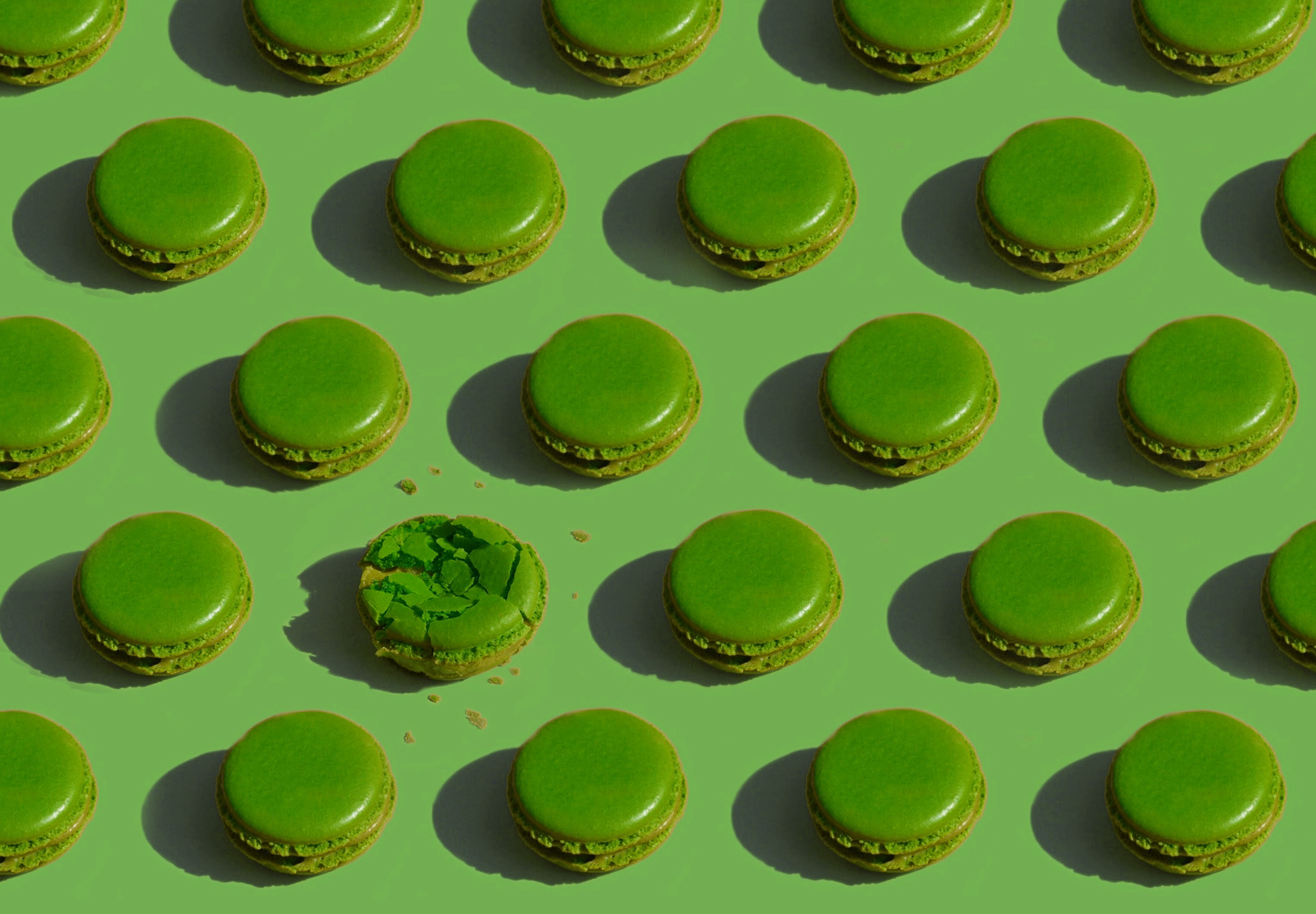 banner image, green macarons laid out in a pattern